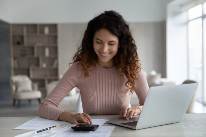 Smiling,Young,Hispanic,Woman,Manage,Household,Family,Budget,Pay,Bills