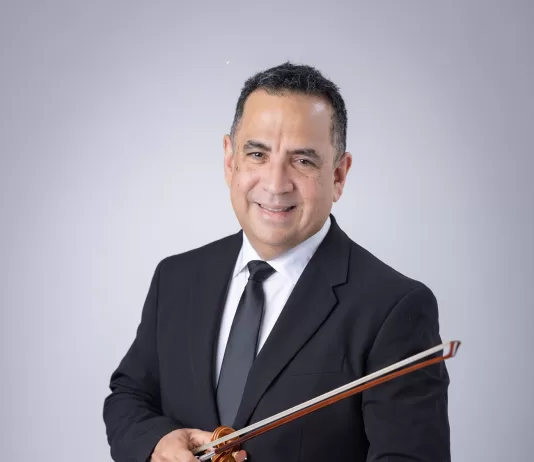 Violinista venezolano Eddy Marcano entre los musicos del XX Festival Internacional Alfredo De Saint Malo 2026